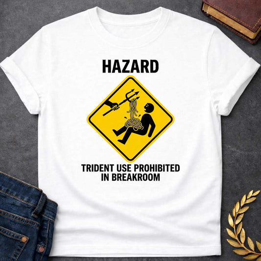 White T-Shirt with a humorous design featuring a bold, yellow, diamond-shaped warning sign. Inside the sign, a stick figure falls backward, looking shocked as a pile of tangled yellow spaghetti spills from their chest and stomach. Above them, an outstretched black silhouette of a hand holds a trident, which has a forkful of the spaghetti tangled in its tines, appearing to have just pulled the pasta away. Above the sign, the word "HAZARD" is printed in large, black, block letters. Below the sign, the text "T