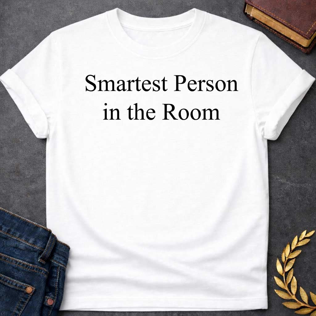 White T-shirt graphic in black featuring large elegant serif text reading "Smartest Person in the Room" — a confident nod to Athena, the Greek Goddess of Wisdom