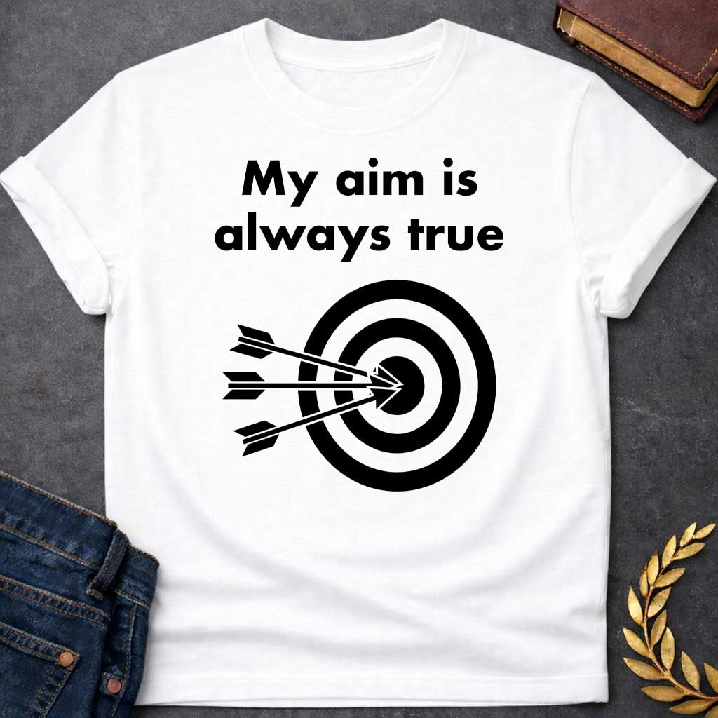White T-shirt graphic At the top, the phrase "My aim is always true" is written in a bold, black, sans-serif font across two lines. Below the text is a black and white bullseye target icon. black white arrows are shown striking the center of the target simultaneously from the left, with their points clustered directly in the "dead center" inner circle