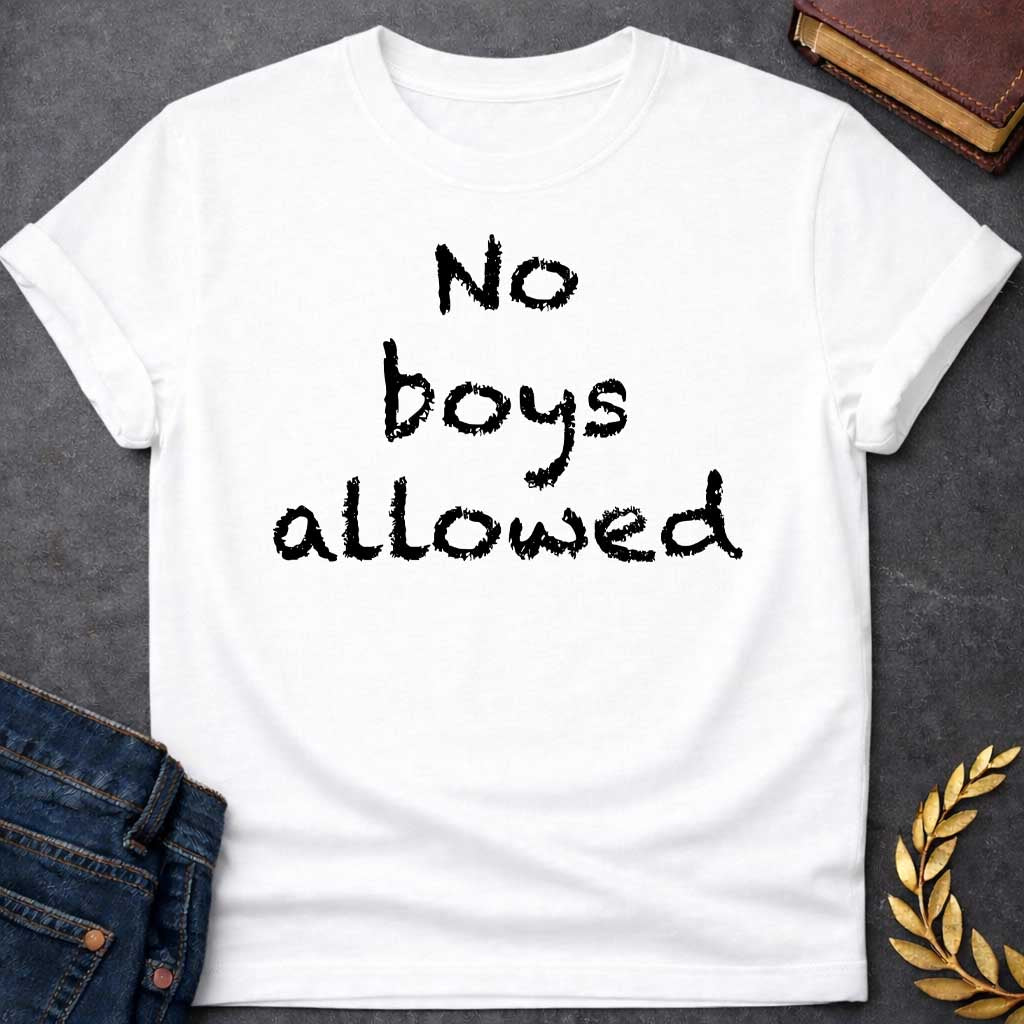 White T-shirt graphic in black text featuring rough hand-carved or bark-textured text reading "No boys allowed" a humorous nod to Artemis, the Greek Goddess of the Hunt and sworn virgin goddess who famously rejected male company