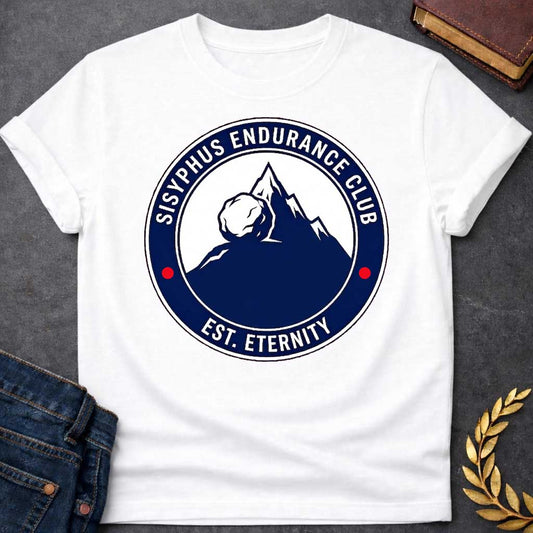 White T-Shirt with a circular, emblem-style graphic design. The center features a dark blue silhouette of a mountain with a large boulder resting near the peak. Surrounding this illustration is a dark blue ring with white text that reads "SISYPHUS ENDURANCE CLUB" arched at the top and "EST. ETERNITY" at the bottom, with two small red dots separating the text on the sides.