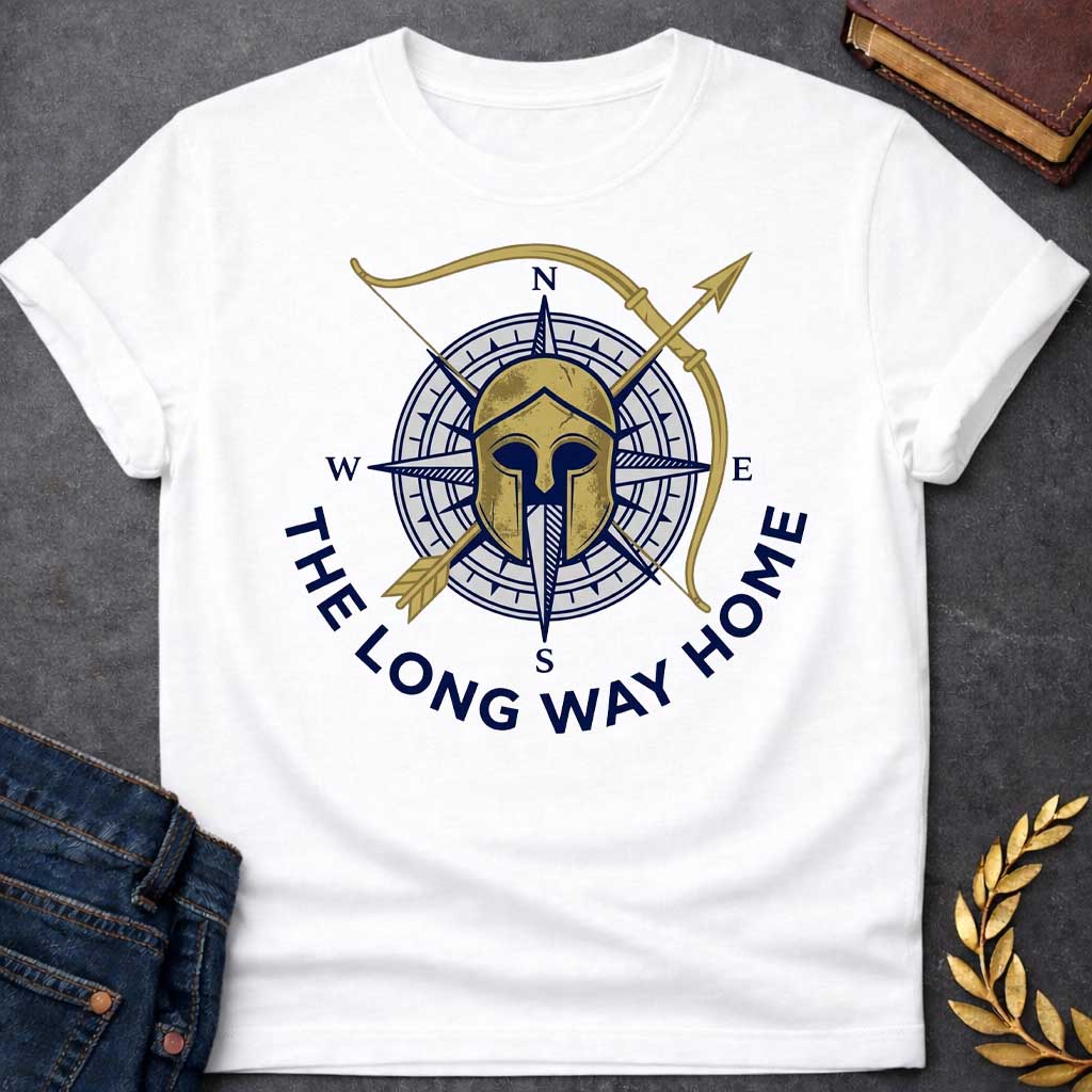 White T-Shirt with a logo design combining Greek warrior imagery with nautical navigation elements. A weathered gold Corinthian helmet overlays a navy blue and white compass rose showing cardinal directions (N, S, E, W). A golden bow and arrow cross diagonally behind. Text reading 'THE LONG WAY HOME' curves around the bottom in navy blue. References Odysseus's epic journey in Homer's Odyssey, blending ancient Greek military symbolism with maritime wayfinding to evoke adventure, perseverance, and the voyage 