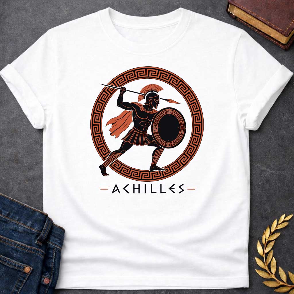 White T-Shirt with an ancient Greek red-figure pottery style illustration of Achilles in dynamic battle pose. The muscular figure is rendered in black silhouette with terracotta-orange details, wearing a crested Corinthian helmet, pleated skirt, flowing cape, and greaves. He holds a round shield with Greek key pattern and raises a spear overhead. Enclosed in a circular border with orange and black meander pattern. Below, 'ACHILLES' is written in geometric font. Evokes classical Greek pottery art.
