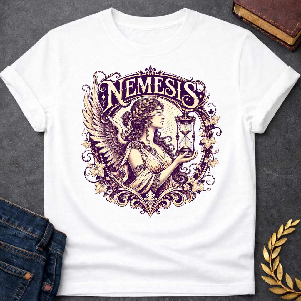 White T-shirt with an Ornate Victorian-style illustration of Nemesis, the Greek goddess of divine retribution, rendered in purple and cream. She wears an ornate headband, flowing robes, and large detailed wings. She holds an hourglass symbolizing time and inevitability. Elaborate Art Nouveau decorative frame features scrolling flourishes, ivy leaves, and flowers surrounding the figure. Ornamental typography reads 'NEMESIS' at top in elegant serif lettering. References the goddess who ensures karmic justice 