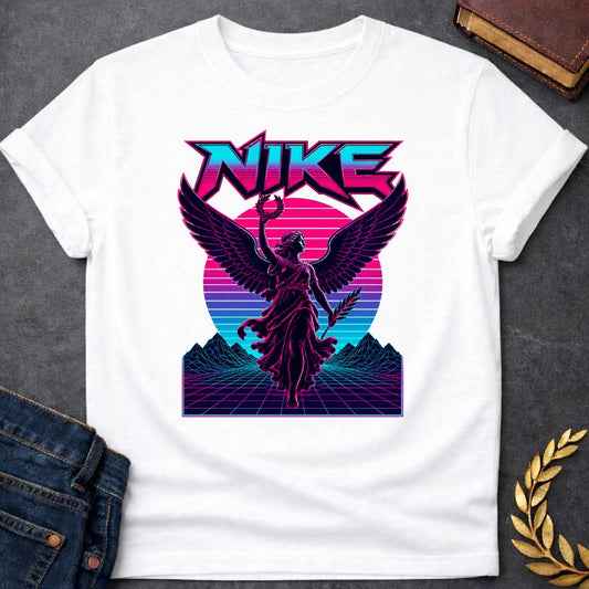White T-shirt with a Vaporwave-style illustration of Nike, the Greek goddess of victory, rendered in neon magenta and cyan. She wears flowing robes with large detailed wings, holding a laurel wreath and palm frond. Bold angular text 'NIKE' appears above in magenta lettering. Geometric mountains and grid landscape create a synthwave aesthetic. Horizontal gradient bands in magenta, purple, and cyan evoke 1980s digital design. Blends classical mythology with modern vaporwave art.