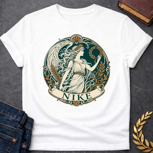 White T-shirt with a Classical medallion design in teal, cream, and gold depicting Nike, the Greek goddess of victory. She wears a flowing chiton and holds a laurel wreath, shown in profile with long wavy hair crowned by another laurel wreath. Large detailed wings extend behind. Ornate Art Nouveau border features scrollwork, gold floral elements, and Greek key patterns. Banner below reads 'NIKE' in teal. Celebrates victory, achievement, and athletic glory in classical style.