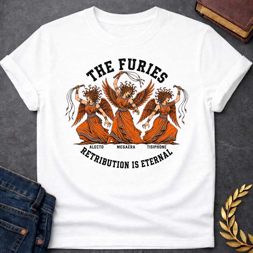 White T-shirt with an Illustration of the three Furies, the Greek goddesses of vengeance. Three winged female figures with serpent hair wear orange draped robes with Greek key patterns. Each carries whips as instruments of punishment. Named left to right: Alecto, Megaera, and Tisiphone. Rendered in black and orange with classical details. Text reads 'THE FURIES' above and 'RETRIBUTION IS ETERNAL' below, celebrating divine justice and eternal consequences for wrongdoing.