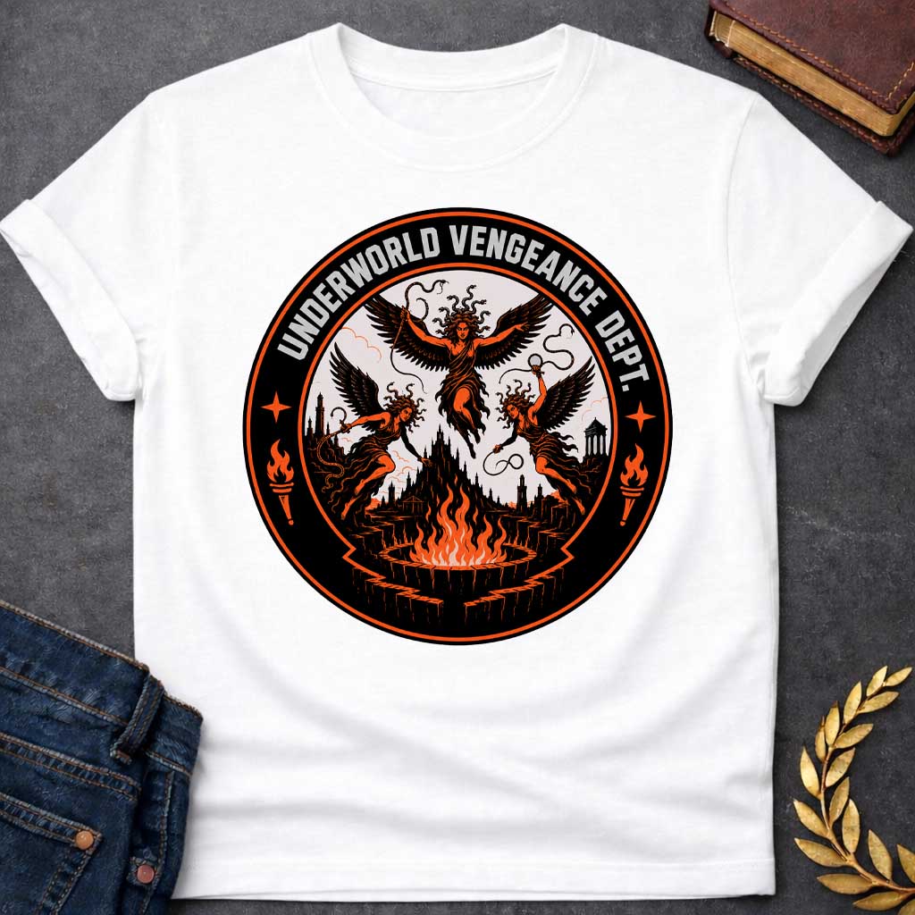 White T-shirt with an Official seal for the 'Underworld Vengeance Department,' a parody blending Greek mythology with government bureaucracy. Three winged Furies with serpent hair occupy the center in orange and black. A dark gothic underworld landscape with towers sprawls below. Large flaming torches frame the design. Four-pointed stars accent the circular seal border. Black, orange, and cream colors create an official emblem celebrating divine vengeance as institutional authority.