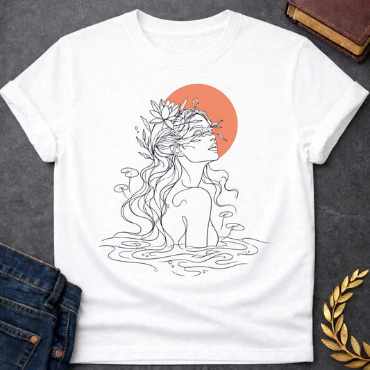 White T-shirt with a minimalist, single-line art illustration of a water nymph. The design features the profile of a woman emerging from a stylized pond, with flowing hair adorned with water lilies and aquatic plants. The sun is represented by a solid, warm terracotta circle behind her head. The graphic uses fine black lines on a clean background, creating a serene, modern, and nature-inspired aesthetic
