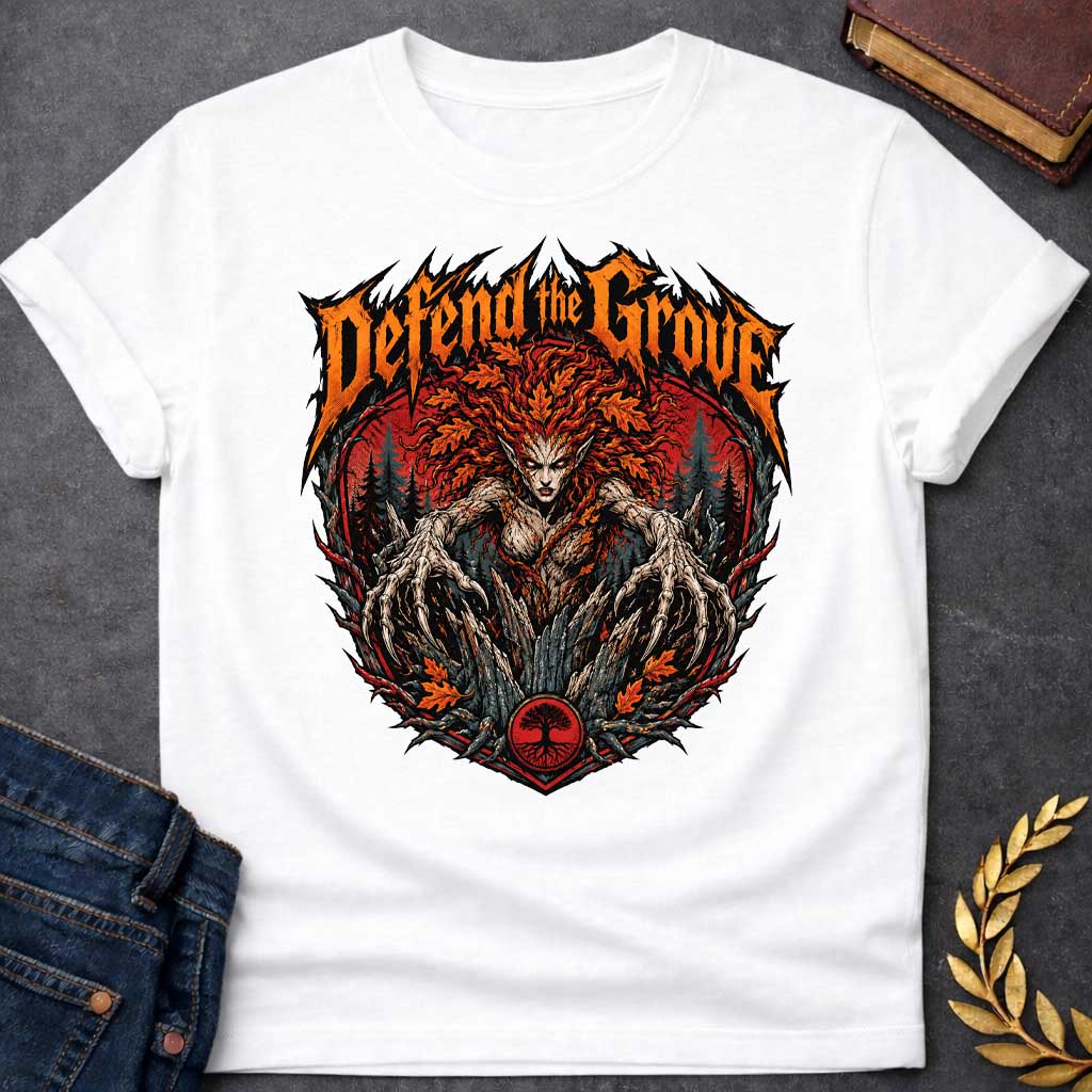 White T-shirt with a heavy metal style t-shirt graphic featuring an aggressive, monstrous dryad in a dark forest. She has fiery red and orange autumn leaf hair and sharp, root-like claws extending forward. Above the central circular graphic, the phrase "Defend the Grove" is written in a jagged, spiky orange death metal font. A small circular tree icon rests at the bottom center of the intense design