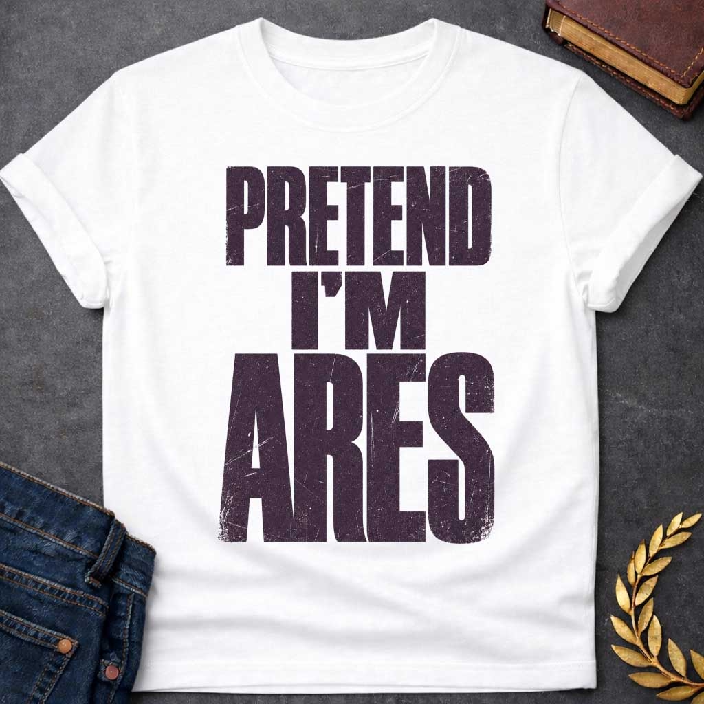 White t-shirt with a Pretend I’m Ares Greek mythology design featuring bold distressed purple typography on a transparent background. The stacked text reads “PRETEND I’M ARES” in a rugged vintage block font, creating a humorous Greek god design inspired by Ares, the god of war, courage, battle, and martial strength.