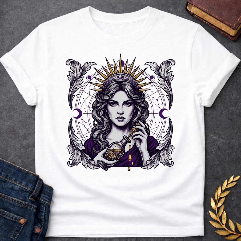 White T-shirt with a Mystical portrait of Medea rendered in black, purple, and gold holding an ornate potion vessel with glowing liquid dripping downward. Elaborate celestial backdrop features a radiating golden sun crown, purple moon phases, and astrological constellation patterns surrounding her face. Ornate white wing designs frame the composition. Intricate occult aesthetic celebrates the legendary Greek sorceress's magical power, ancient wisdom, and mystical enchantment.