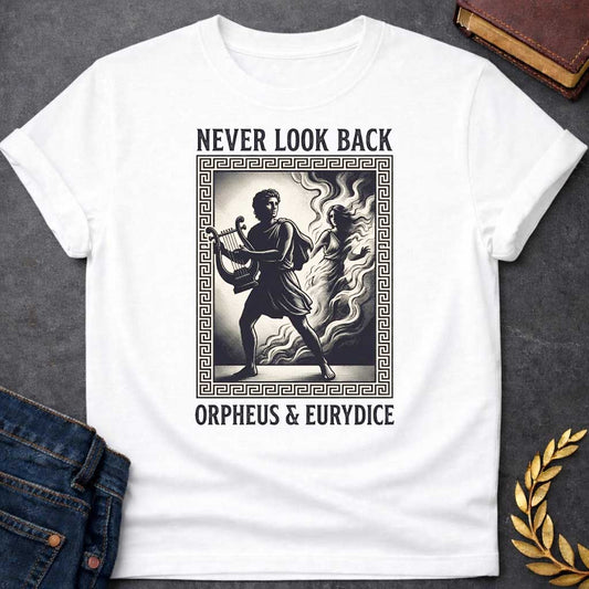 White t-shirt in engraved woodcut style: Orpheus strides forward carrying a lyre while Eurydice dissolves into smoke and shadow behind him, reaching out. The scene sits within a Greek key-patterned rectangular border, framed by bold serif text above and below, on a cream and black palette.