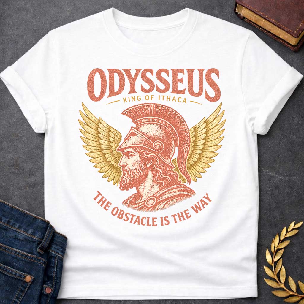 White t-shirt with a Vintage Odysseus Greek mythology design featuring the legendary King of Ithaca in profile wearing a classical crested helmet, framed by large golden wings. Distressed terracotta and gold artwork includes the text “Odysseus,” “King of Ithaca,” and “The Obstacle Is the Way,” inspired by The Odyssey and his legendary journey home.