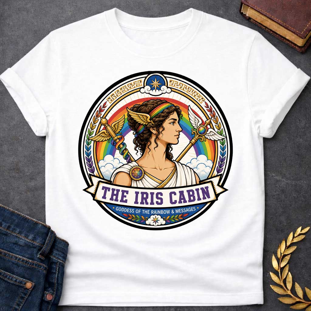 White T-shirt with a Iris Greek mythology cabin design featuring the goddess of the rainbow and messages in a colorful circular emblem. Iris wears a rainbow headband and winged accents, surrounded by a vibrant rainbow, clouds, winged staffs, laurel leaves, and celestial details. Text reads “The Iris Cabin” and “Goddess of the Rainbow & Messages,”
