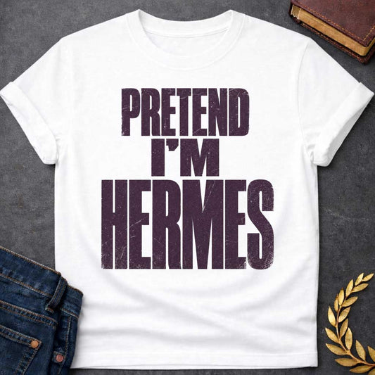 White t-shirt with a Pretend I’m Hermes Greek mythology  design featuring bold distressed dark purple typography on a transparent background. The stacked text reads “PRETEND I’M HERMES” in a rugged vintage block font, creating a humorous design inspired by Hermes, the Greek god of travel, messengers, trade, and trickery.