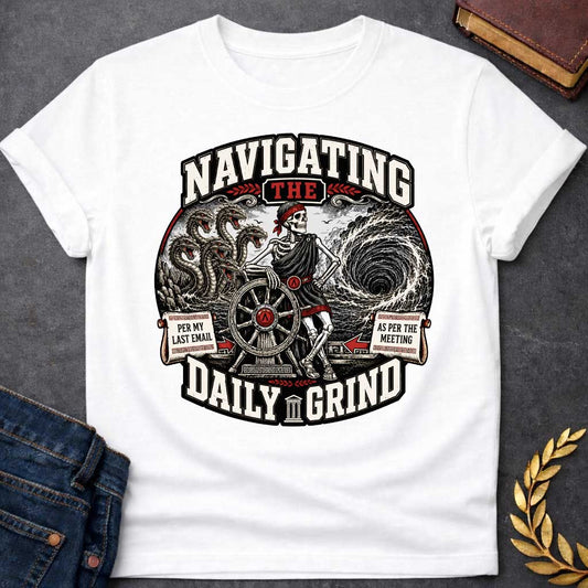 White t-shirt with A skeleton in a toga casually leans on a ship's wheel between a multi-headed sea monster and a churning whirlpool. Bold text reads "NAVIGATING THE DAILY GRIND," with side scrolls humorously labeled "PER MY LAST EMAIL" and "AS PER THE MEETING."